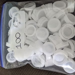 Clear plastic bottle caps